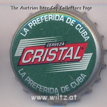 Beer cap Nr.10436: Cristal produced by Cerveceria Bucanero S.A./Holguin